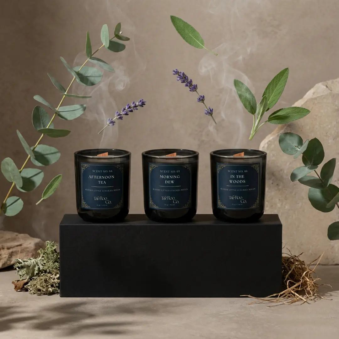 Aromatic discovery kit with three 2.5 oz mini candles: Morning Dew, Afternoon Tea, and In the Woods