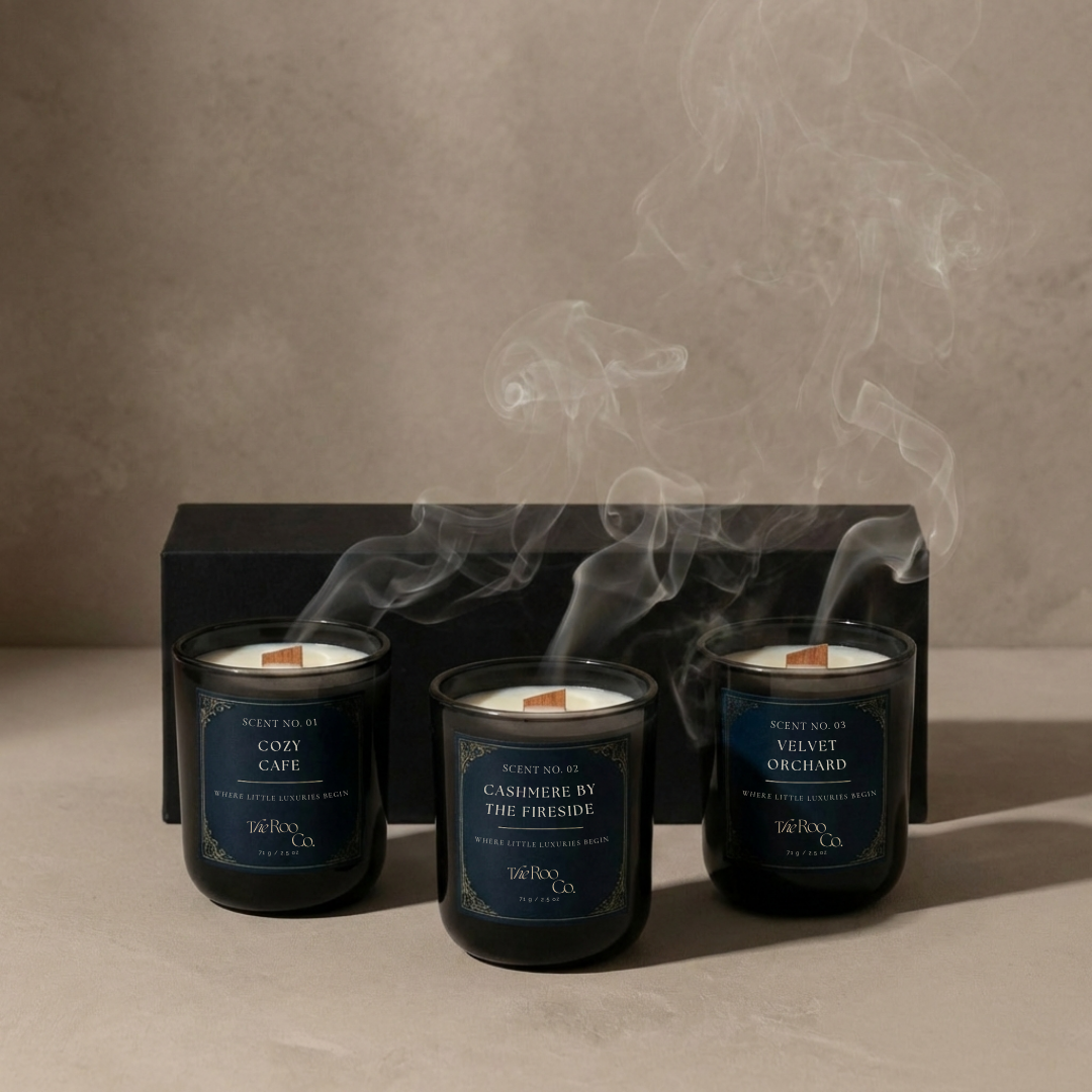 Three 2.5 oz mini signature candles featuring Cozy Cafe, Cashmere by the Fireside, and Velvet Orchard