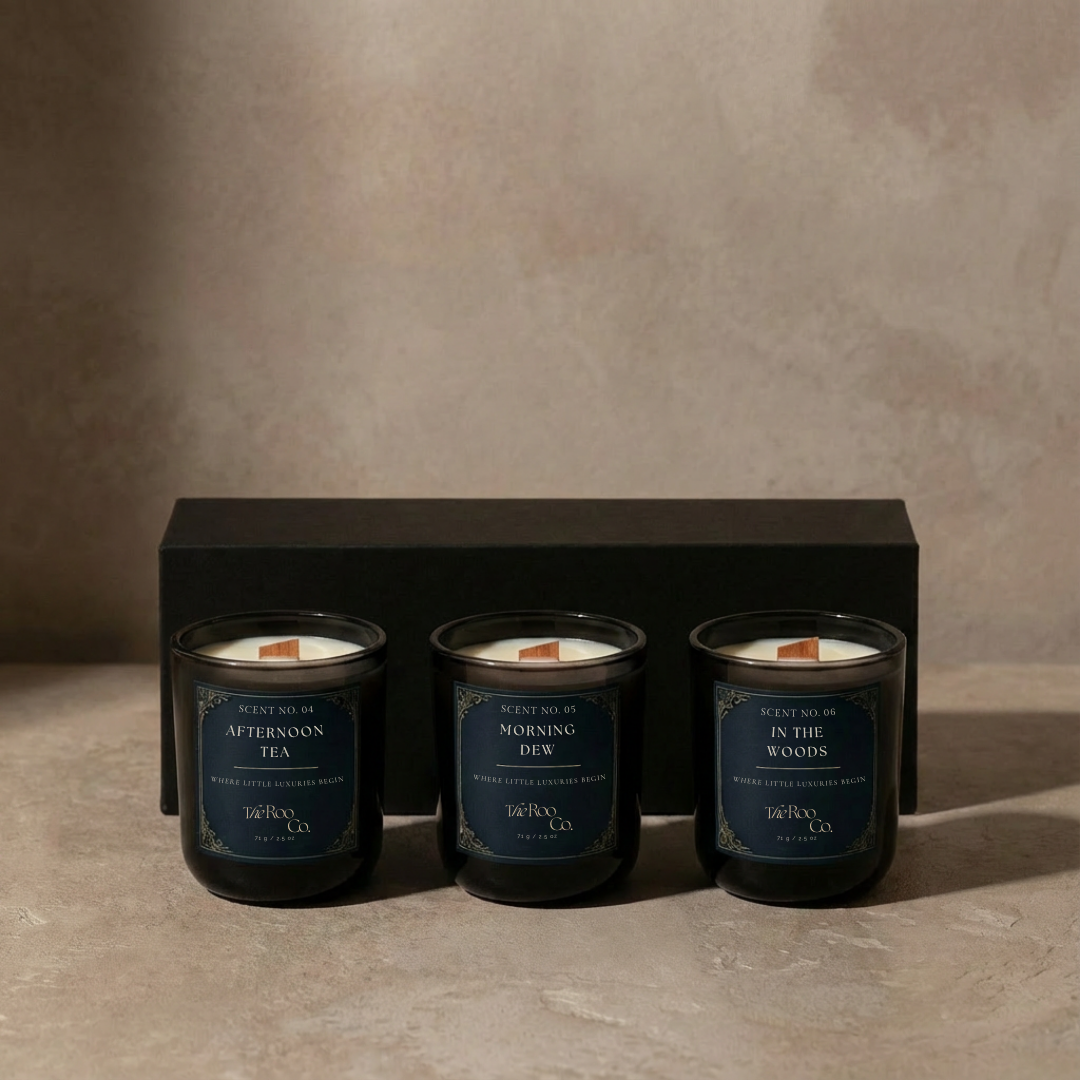 Three 2.5 oz mini aromatic candles featuring Morning Dew, Afternoon Tea, and In the Woods