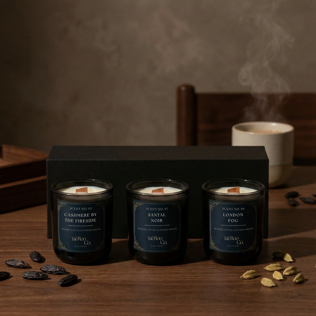 Amber discovery kit with three 2.5 oz mini candles: London Fog, Santal Noir, and Cashmere by the Fireside