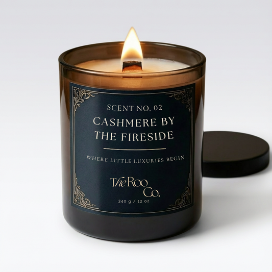 Luxury scented candle in dark glass jar with wooden wick – Cashmere by the Fireside by The Roo Co