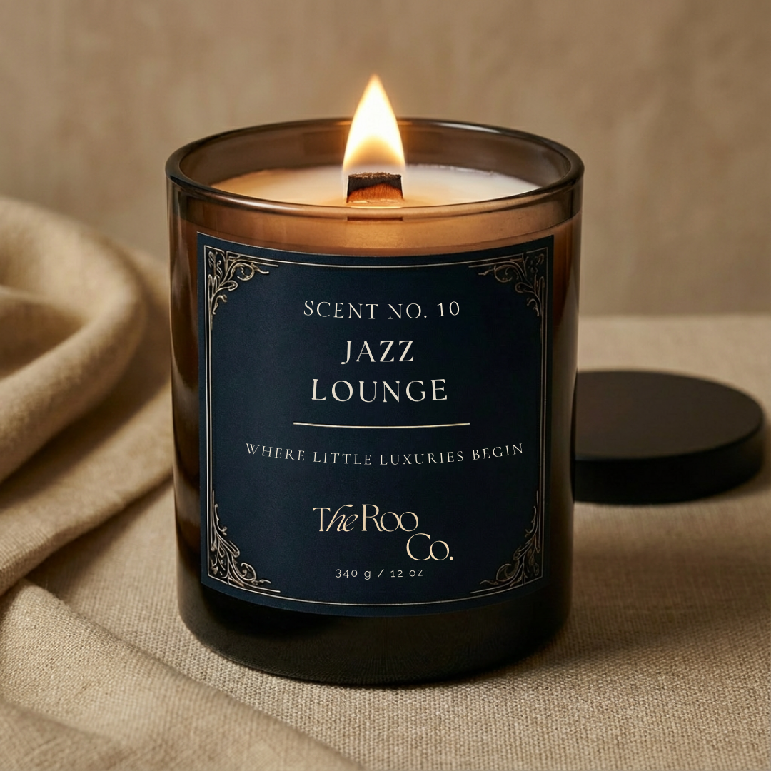 Luxury scented candle styled on neutral linen fabric – Jazz lounge warm home decor candle by The Roo Co