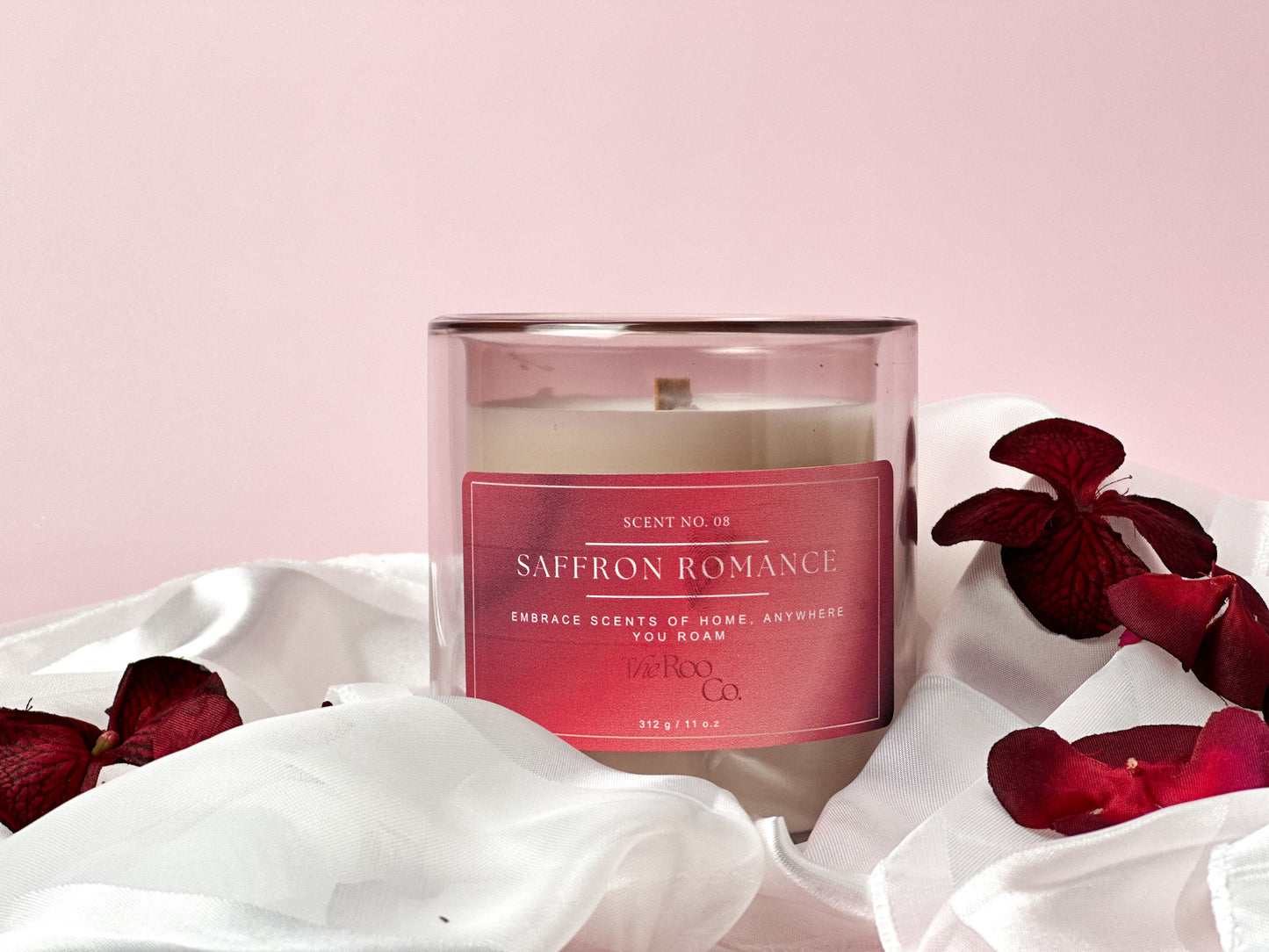 Luxurious Saffron Romance candle in a sophisticated glass vessel, exuding opulence. Inspired by Baccarat Rouge 540